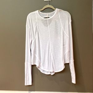 Free People Movement, NEW without tags. Has  thumb holes